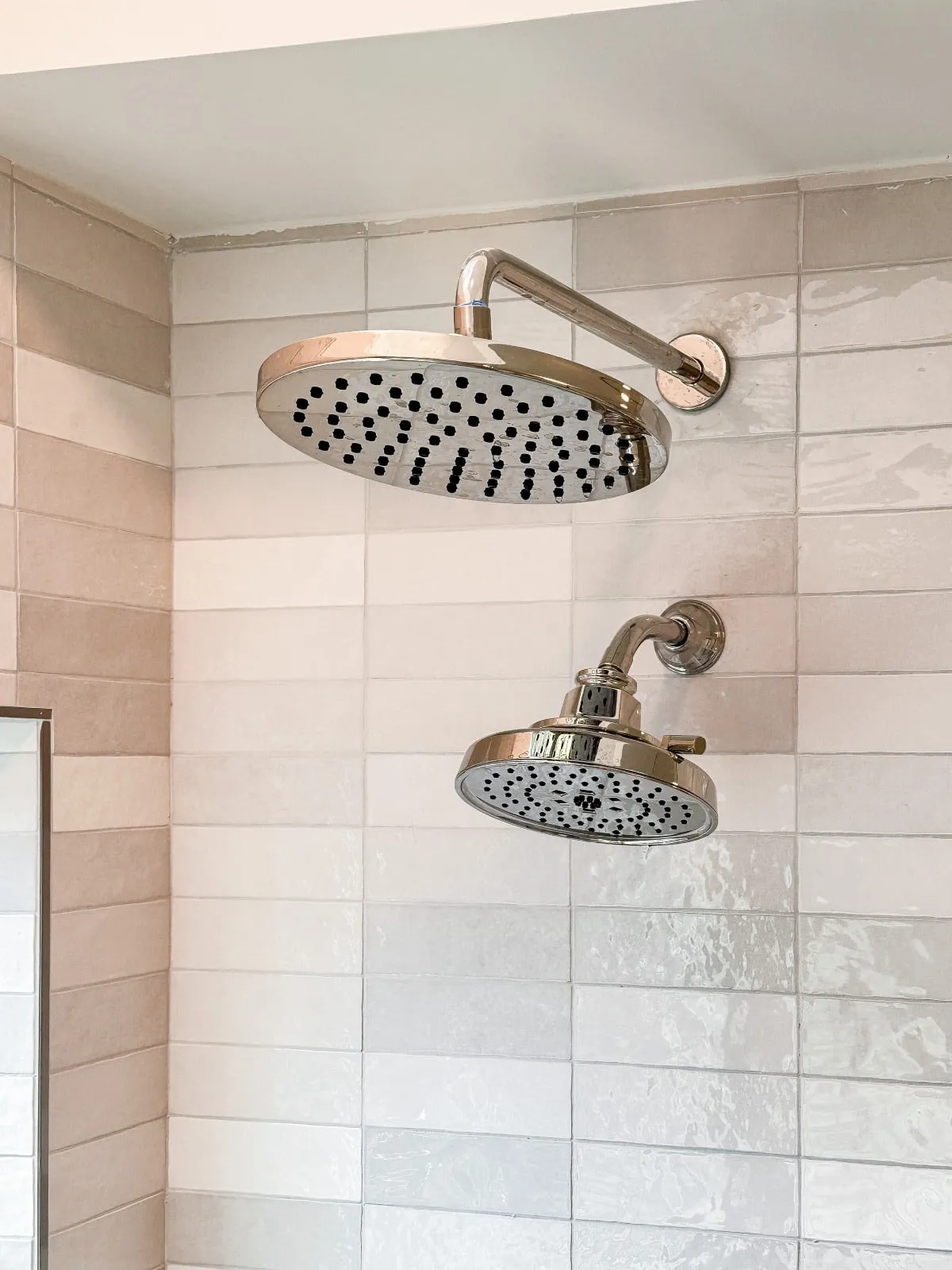 Marble bathroom with frameless glass and brushed nickel fittings in Carlton Woods, The Woodlands, TX