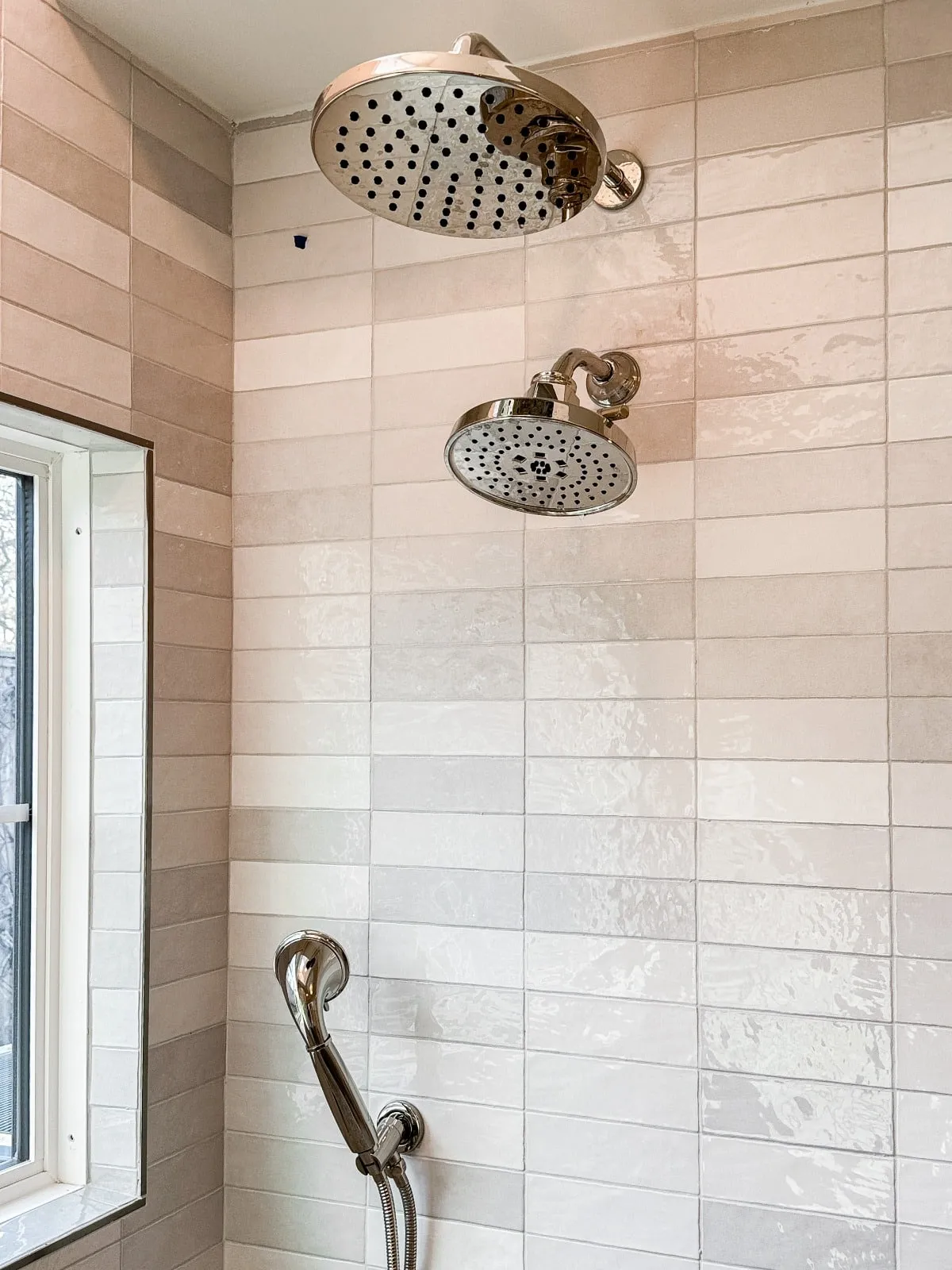 Marble bathroom with frameless glass and brushed nickel fittings in Carlton Woods, The Woodlands, TX