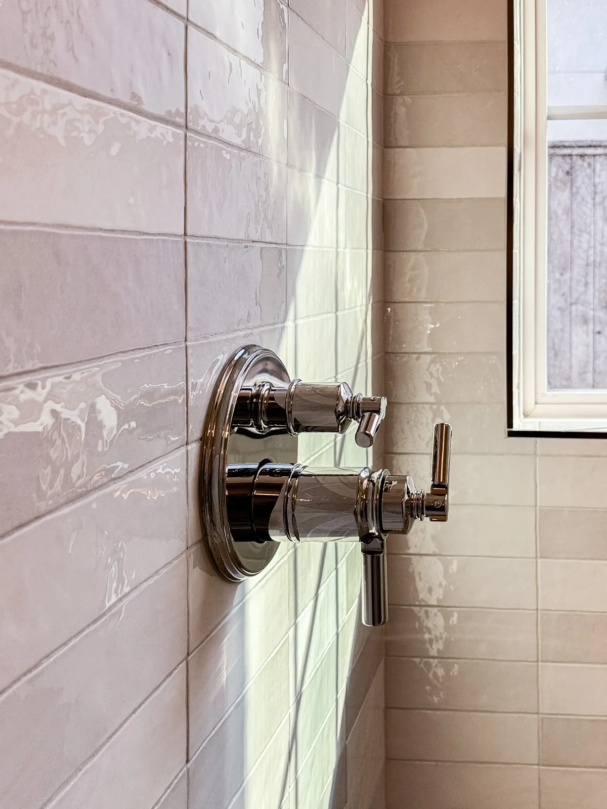 Marble bathroom with frameless glass and brushed nickel fittings in Carlton Woods, The Woodlands, TX