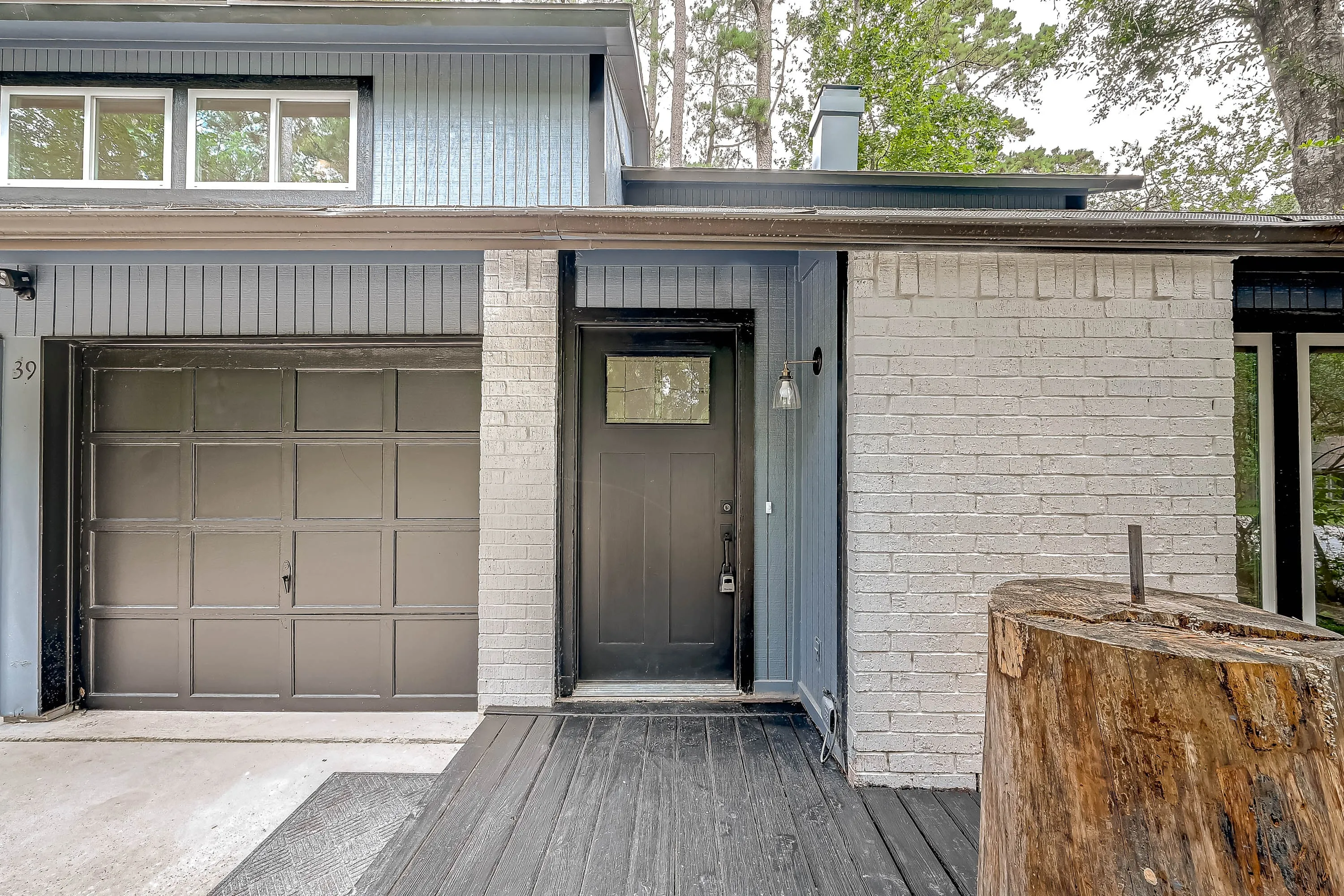Whole home renovation of a mid-century house with a new kitchen and stair in The Woodlands, TX