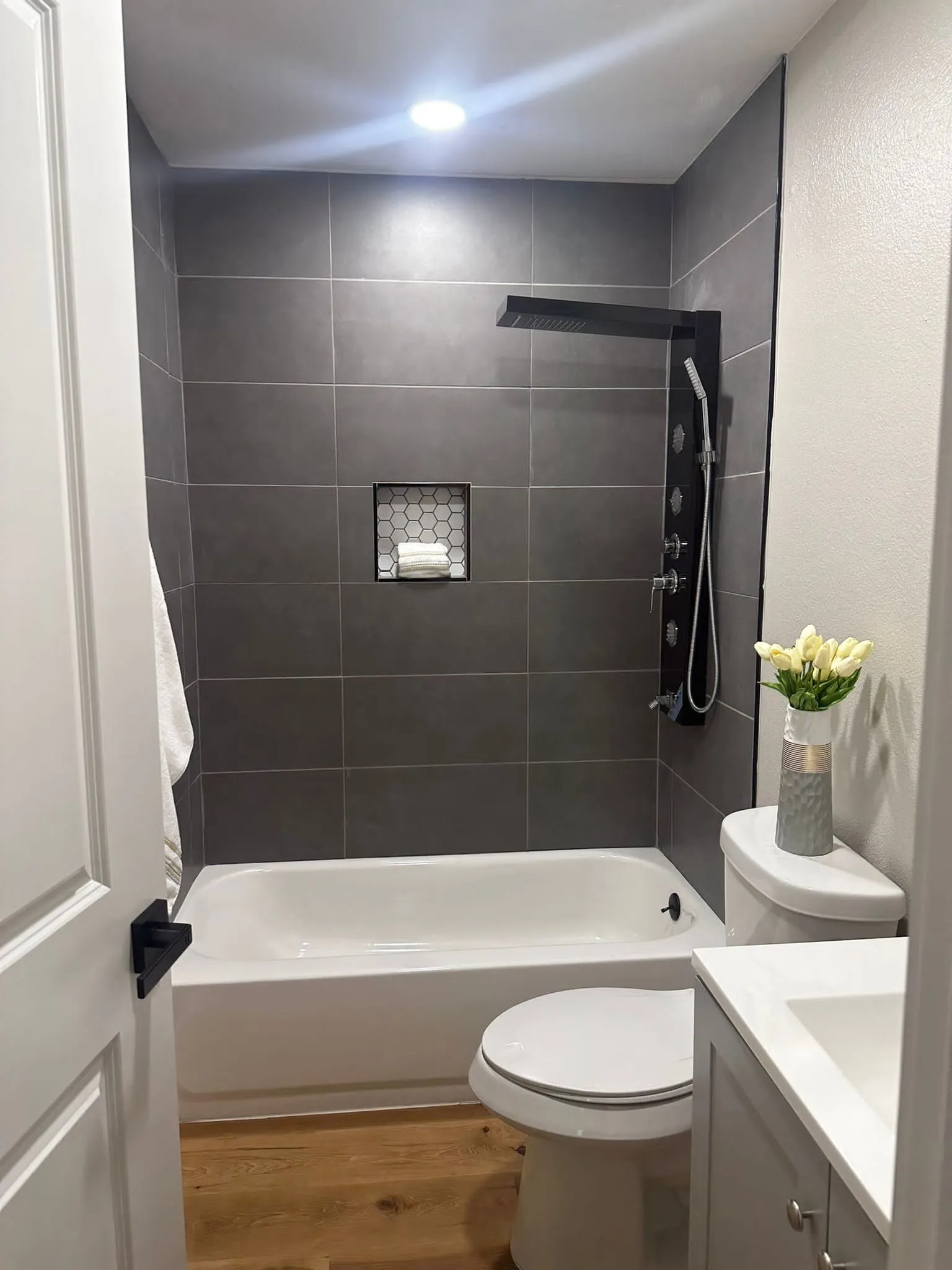 Whole home renovation of a mid-century house with a new kitchen and stair in The Woodlands, TX