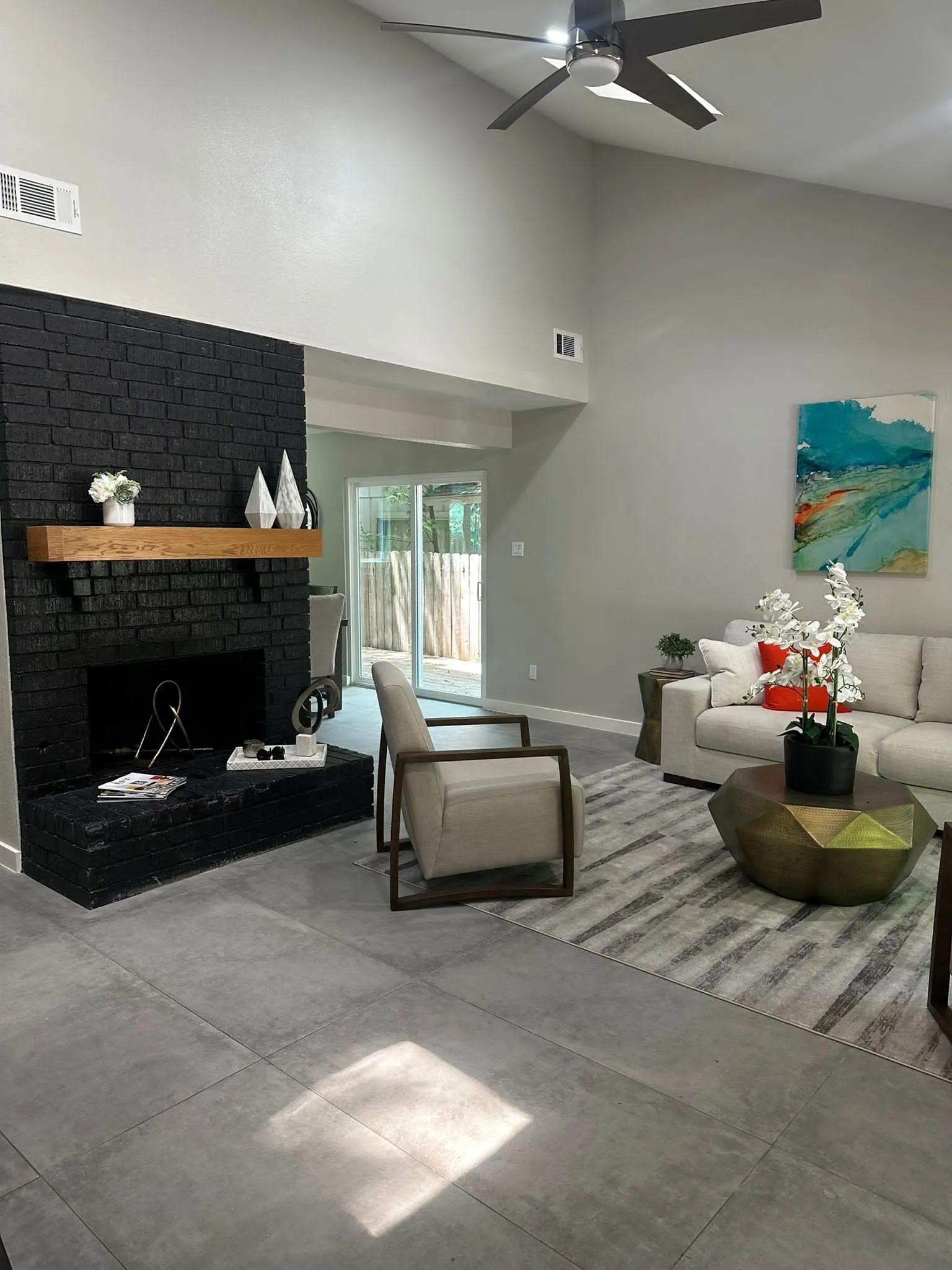 Whole home renovation of a mid-century house with a new kitchen and stair in The Woodlands, TX