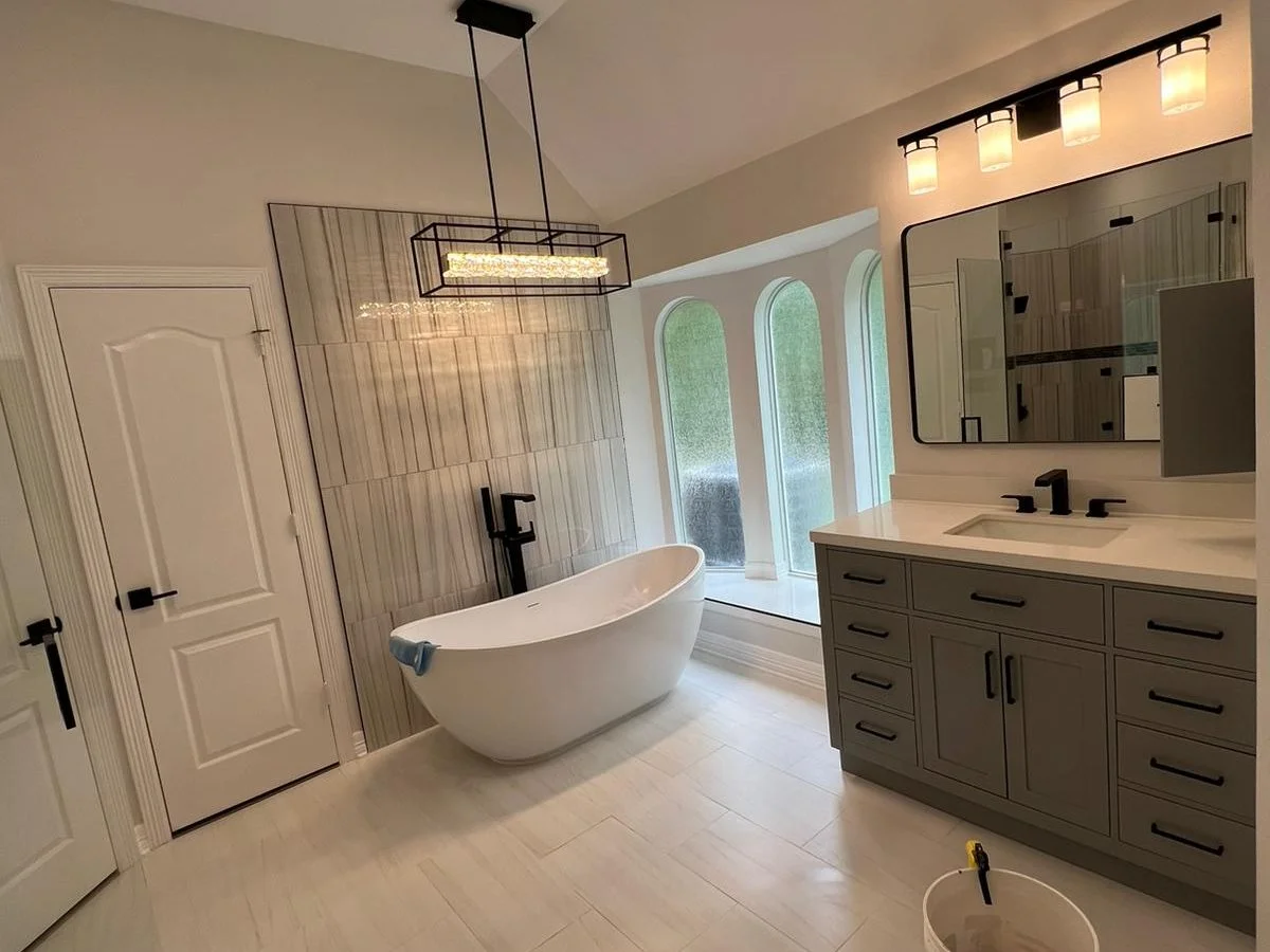 Primary bathroom suite remodel with freestanding tub and double vanity in The Woodlands, TX