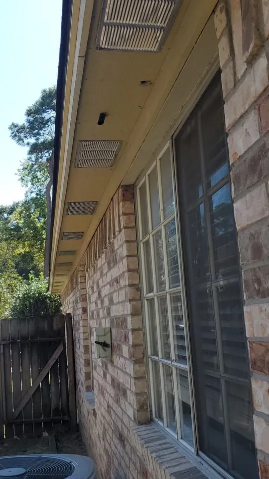 Whole home renovation with new plank flooring and arched windows in Panther Creek, The Woodlands, TX